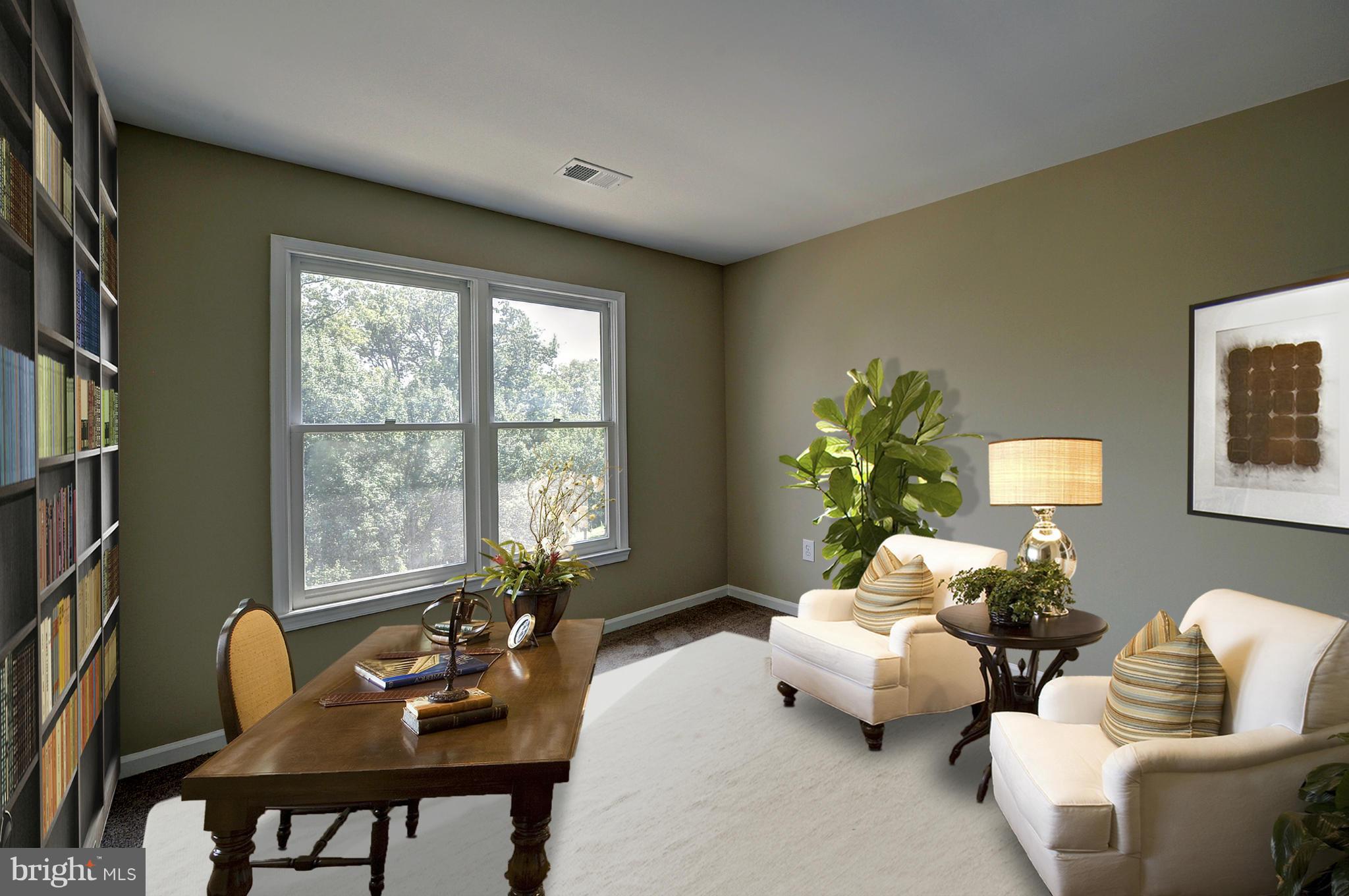 7706 Hickory Glen Way Springfield, VA 22153 - Photo 12 of 21 a living room with furniture and a potted plant