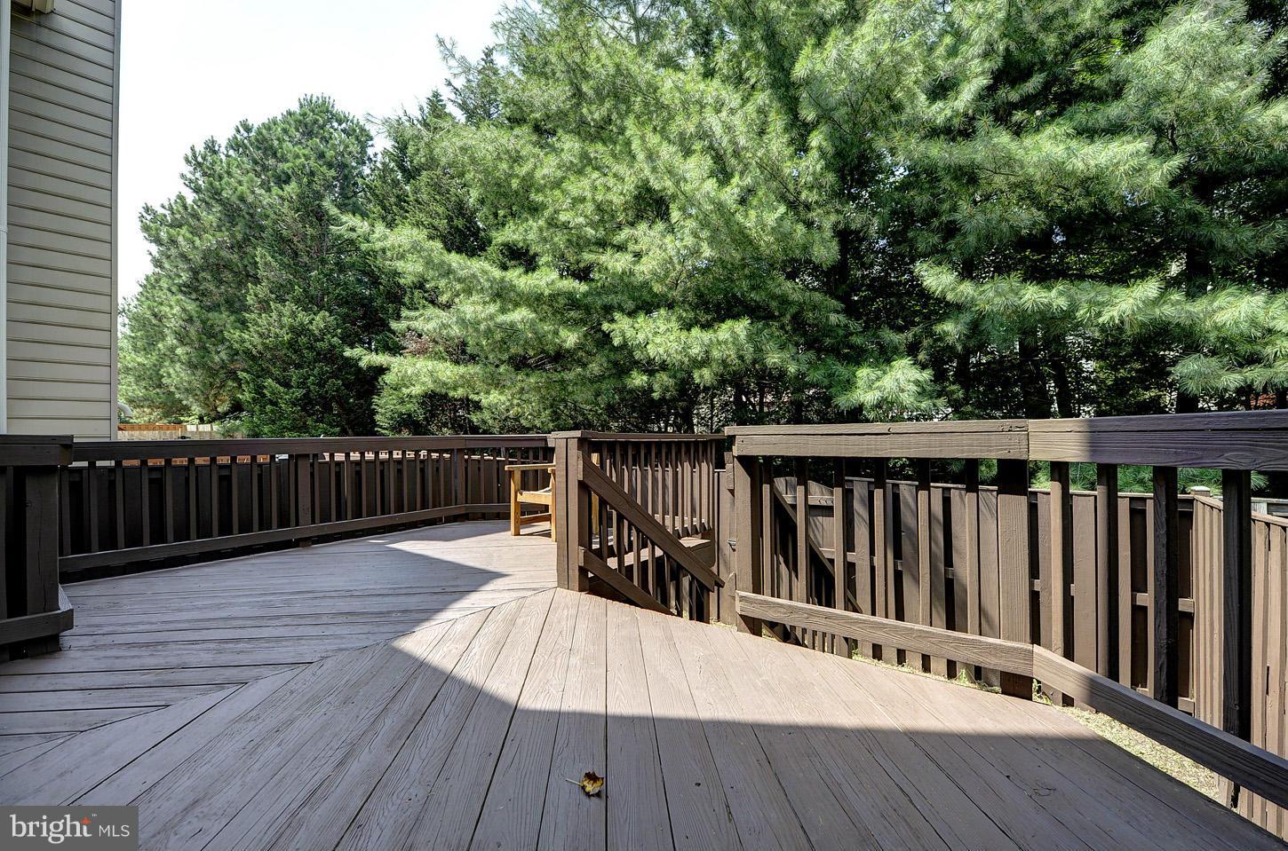 7706 Hickory Glen Way Springfield, VA 22153 - Photo 18 of 21 a view of deck with patio