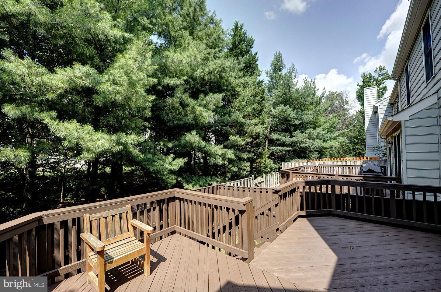7706 Hickory Glen Way Springfield, VA 22153 - Photo 19 of 21 a view of balcony with deck and wooden floor