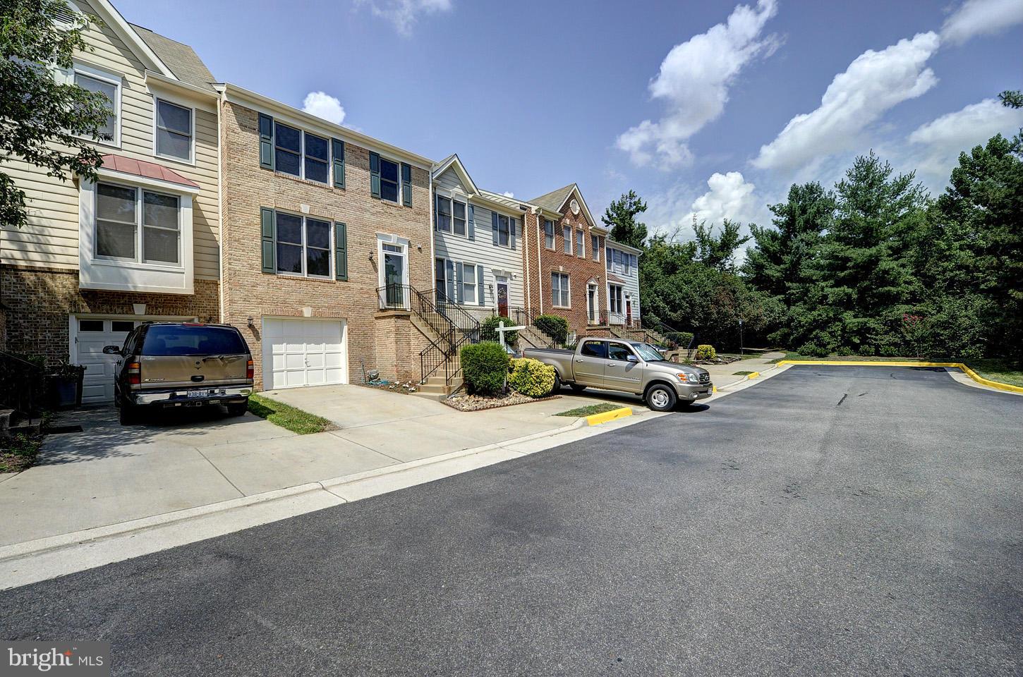 7706 Hickory Glen Way Springfield, VA 22153 - Photo 21 of 21 a car parked on the side of a street