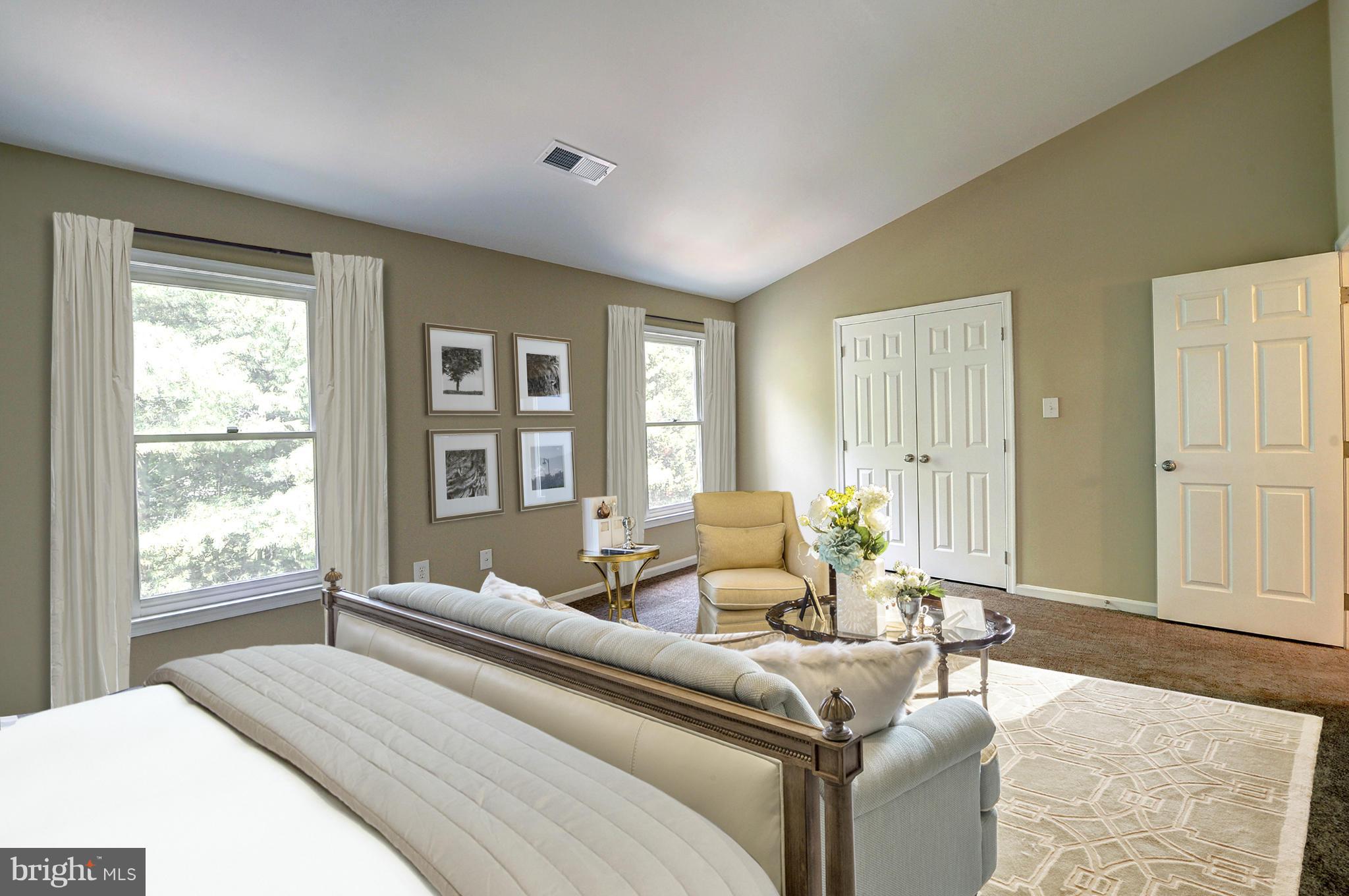 7706 Hickory Glen Way Springfield, VA 22153 - Photo 10 of 21 a living room with furniture and large windows