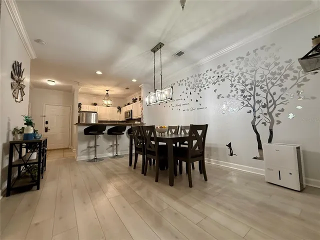 a view of a dining room with furniture