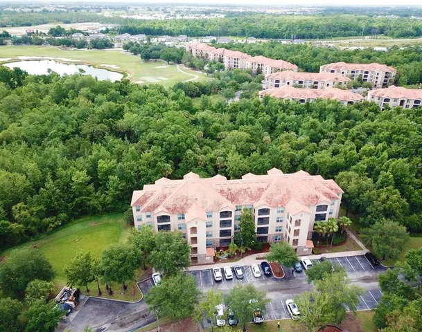 an aerial view of a house with garden space and outdoor space