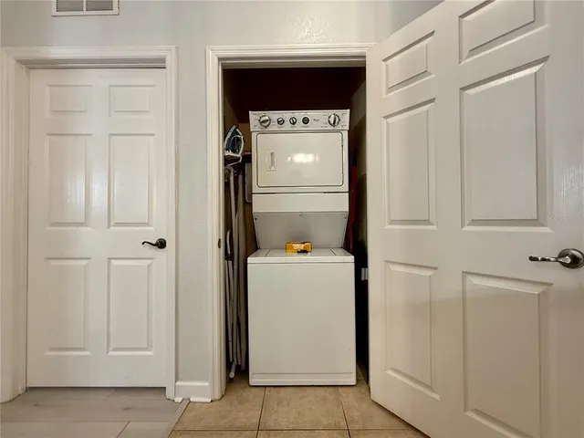 a view of hallway with washer and dryer