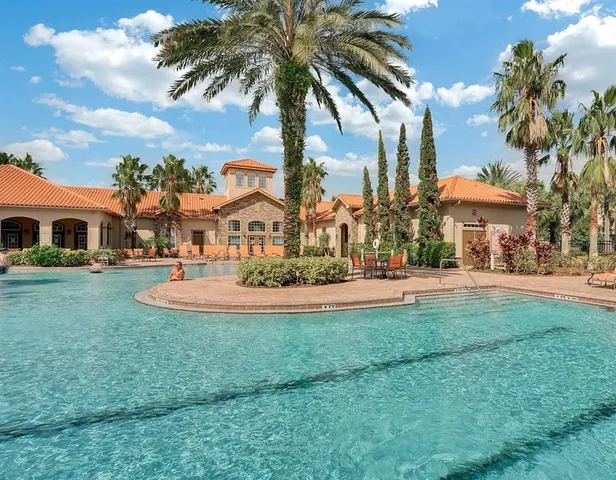 a view of multiple houses with a yard