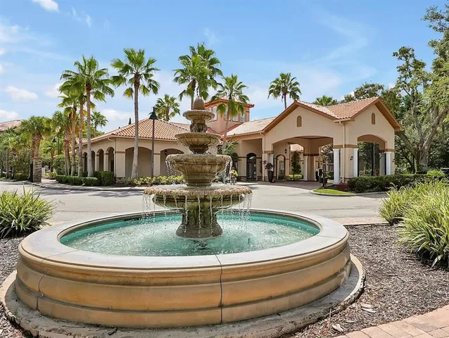 a view of house with swimming pool