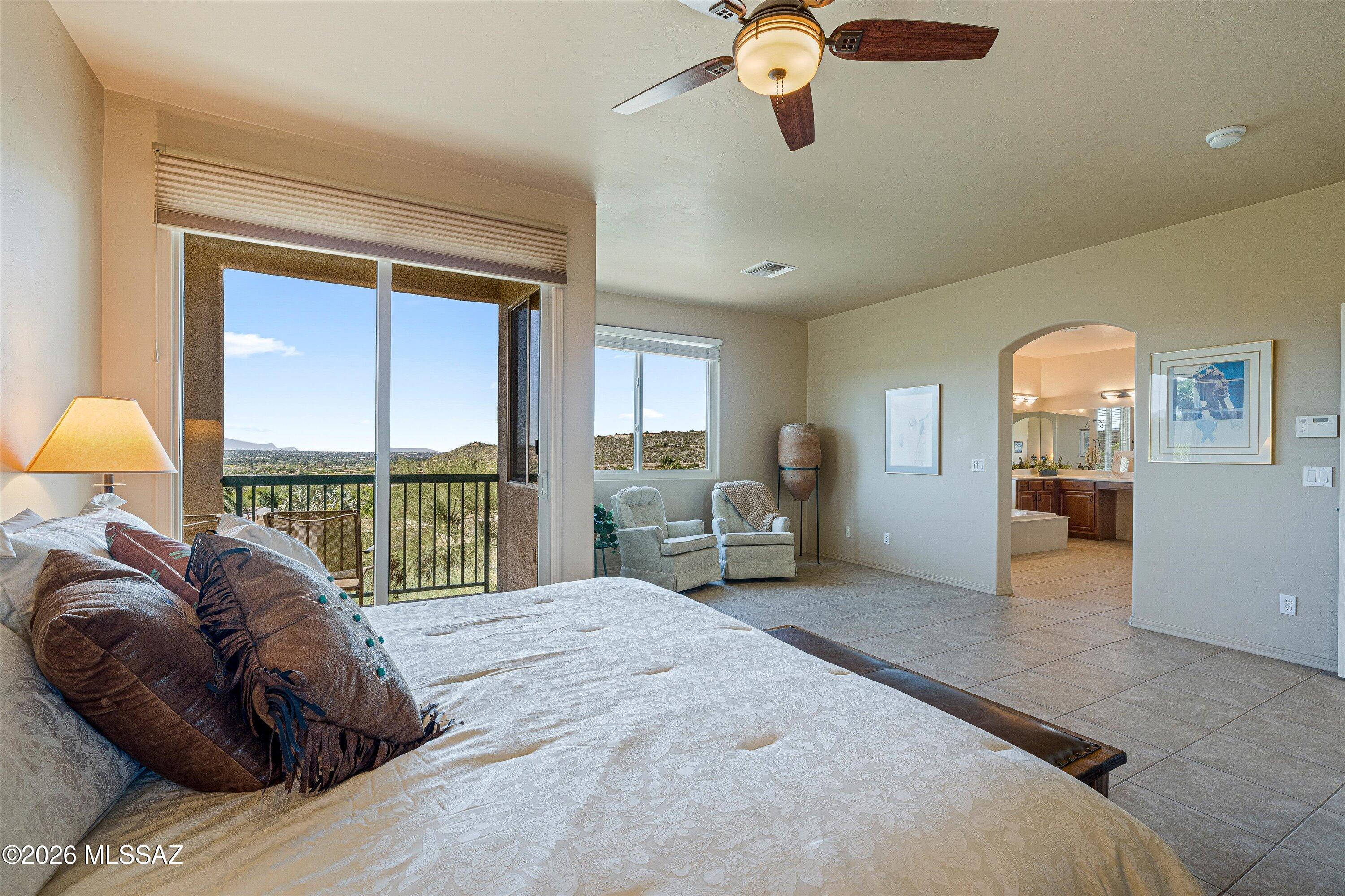 7452 East Ridge Point Road Tucson, AZ 85750 - Photo 21 of 42 Primary Bedroom with City Views