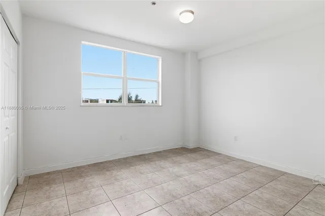 an empty room with a window
