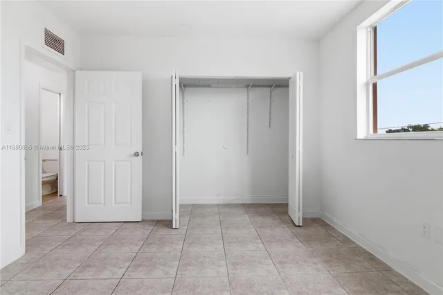 an empty room with a window