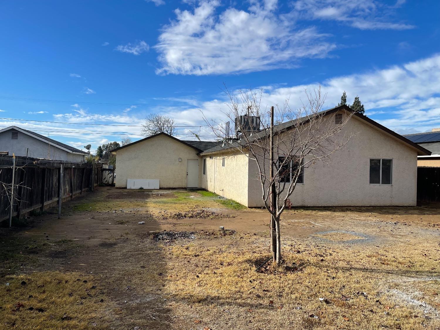 405 Fig Street Madera, CA 93638 - Photo 6 of 22 a house view with a backyard space