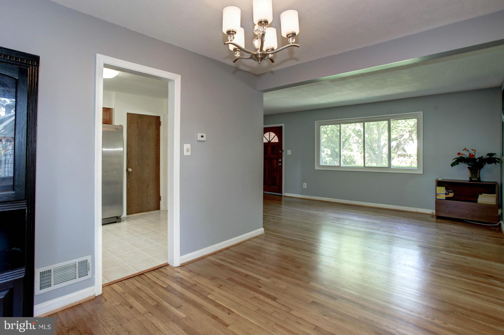 5815 Danbury Road Springfield, VA 22150 - Photo 11 of 27 a view of livingroom with window and hardwood floor