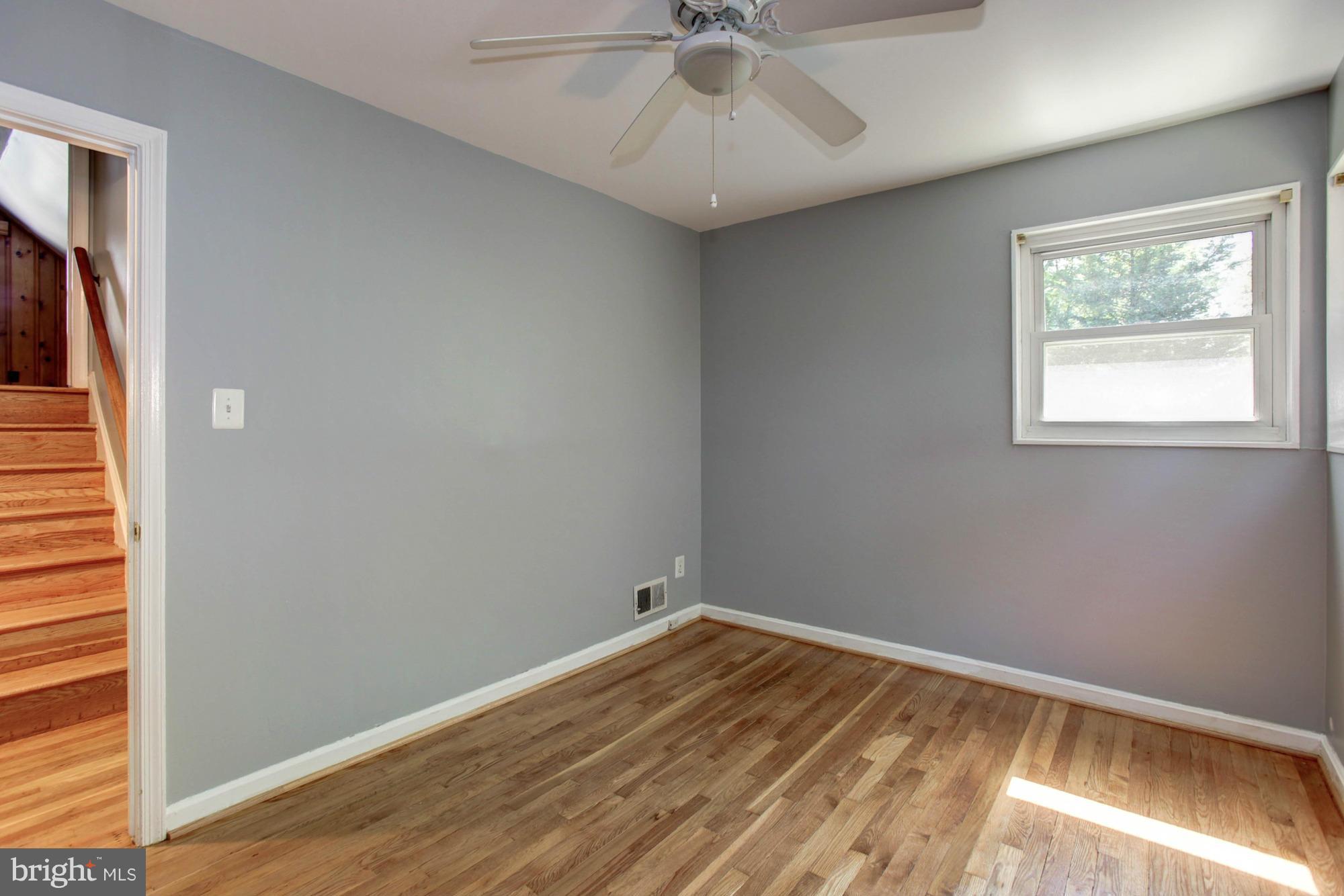 5815 Danbury Road Springfield, VA 22150 - Photo 22 of 27 a view of room with window and ceiling fan