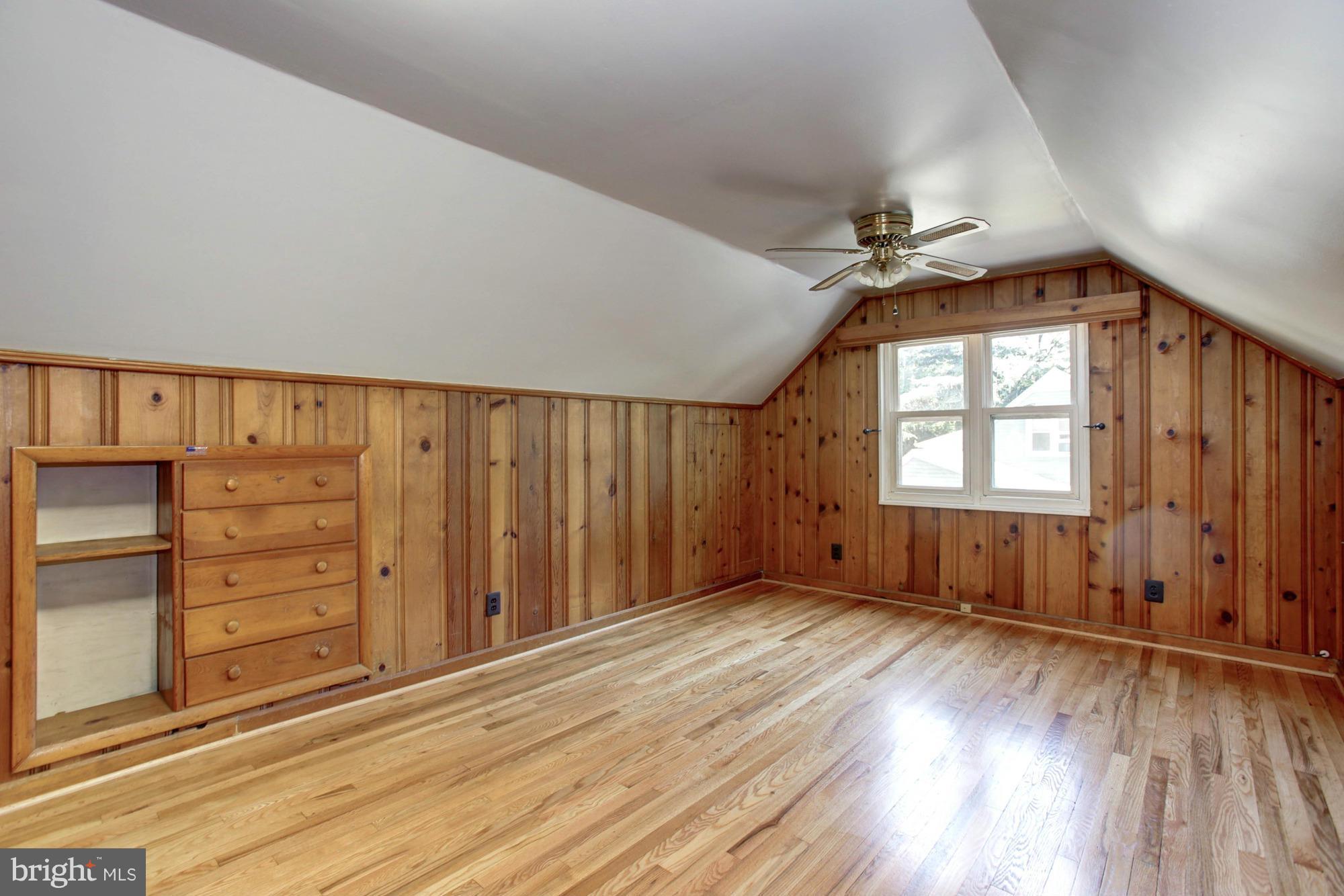 5815 Danbury Road Springfield, VA 22150 - Photo 23 of 27 wooden floor in an empty room with a window