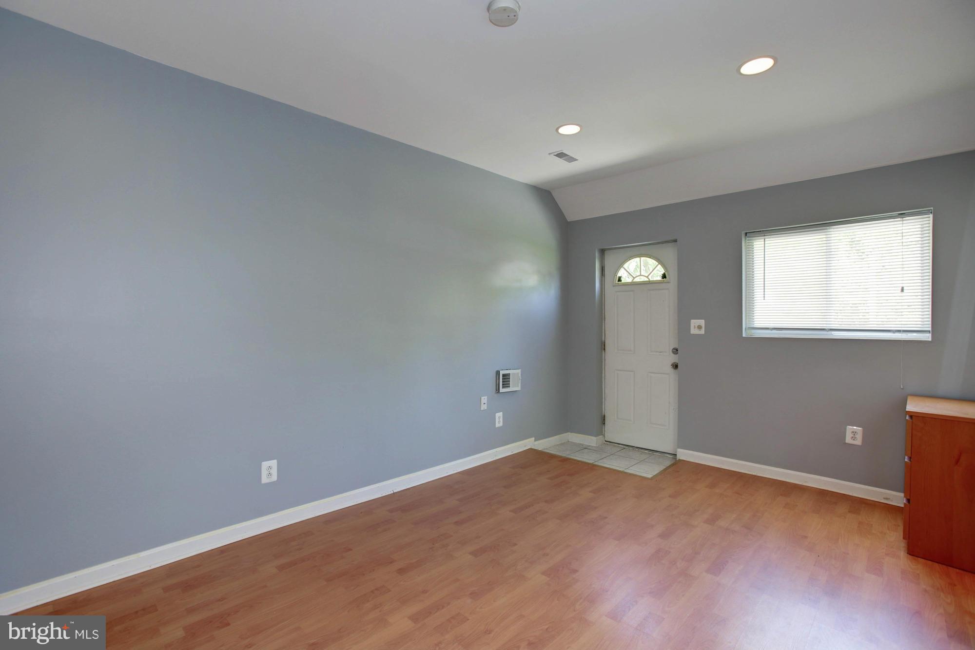 5815 Danbury Road Springfield, VA 22150 - Photo 9 of 27 an empty room with windows and closet