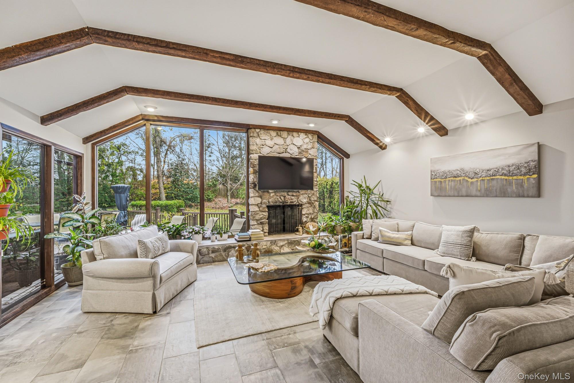 123 Robby Lane Manhasset Hills, NY 11040 - Photo 7 of 30 a living room with furniture and a large window