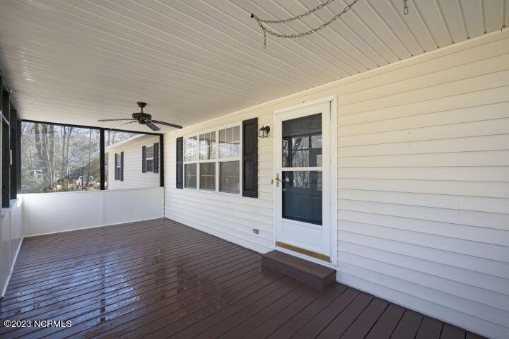 2255 Memorial Church Road Kenly, NC 27542 - Photo 6 of 38 Front Screened Porch