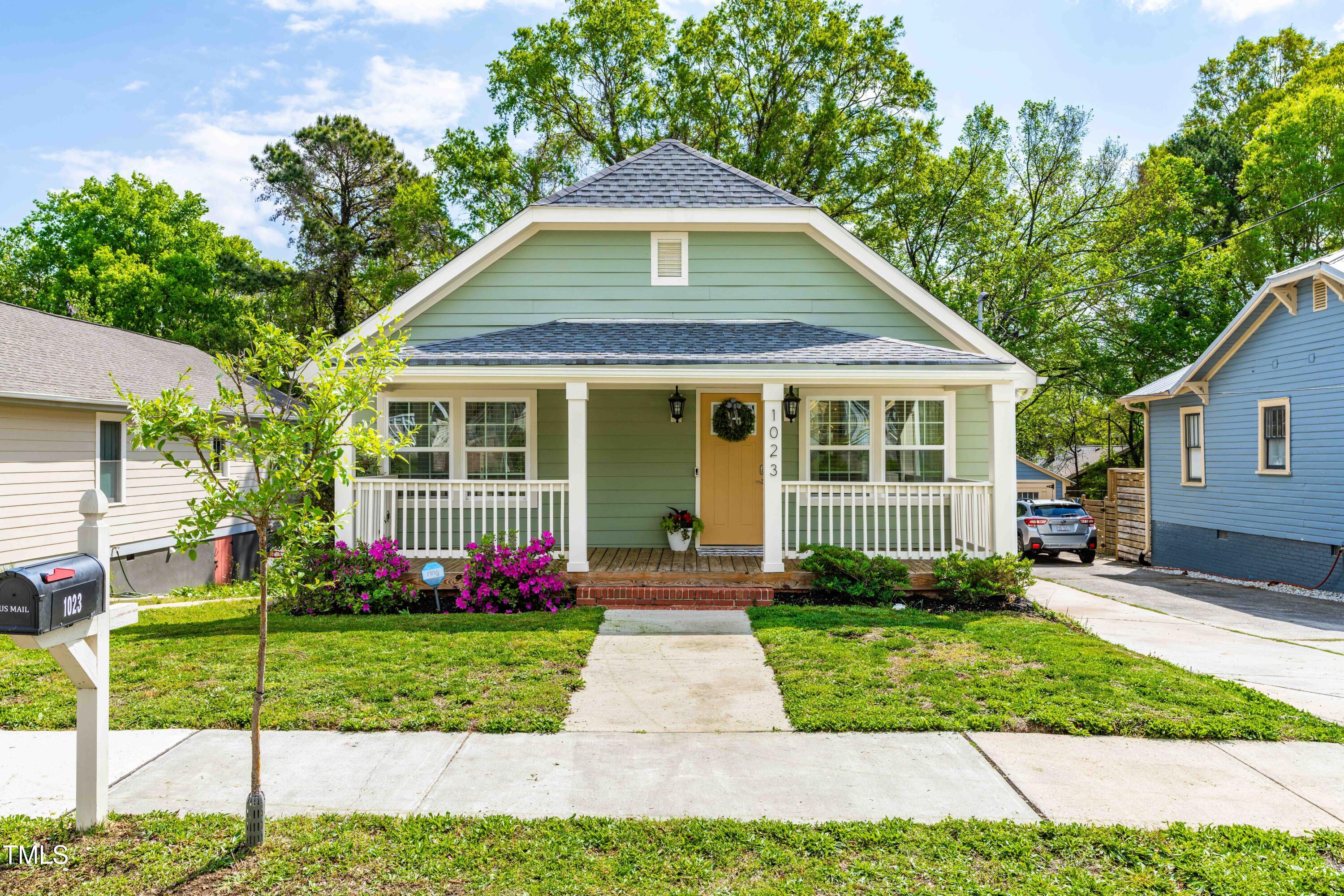 1023 Kent Street Durham, NC 27707 - Photo 1 of 40 a front view of a house with garden