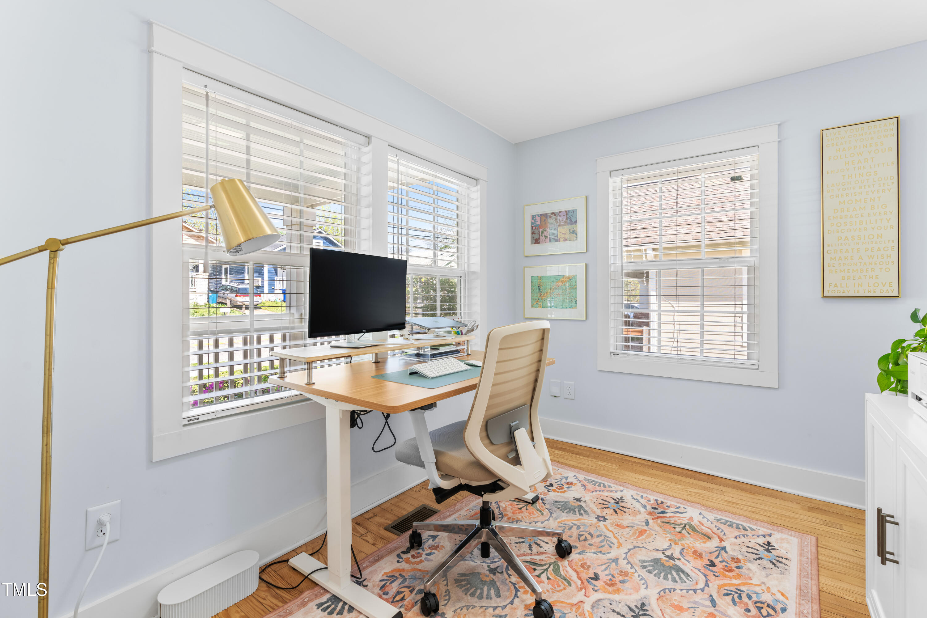1023 Kent Street Durham, NC 27707 - Photo 10 of 40 a view of a workspace with furniture and a window