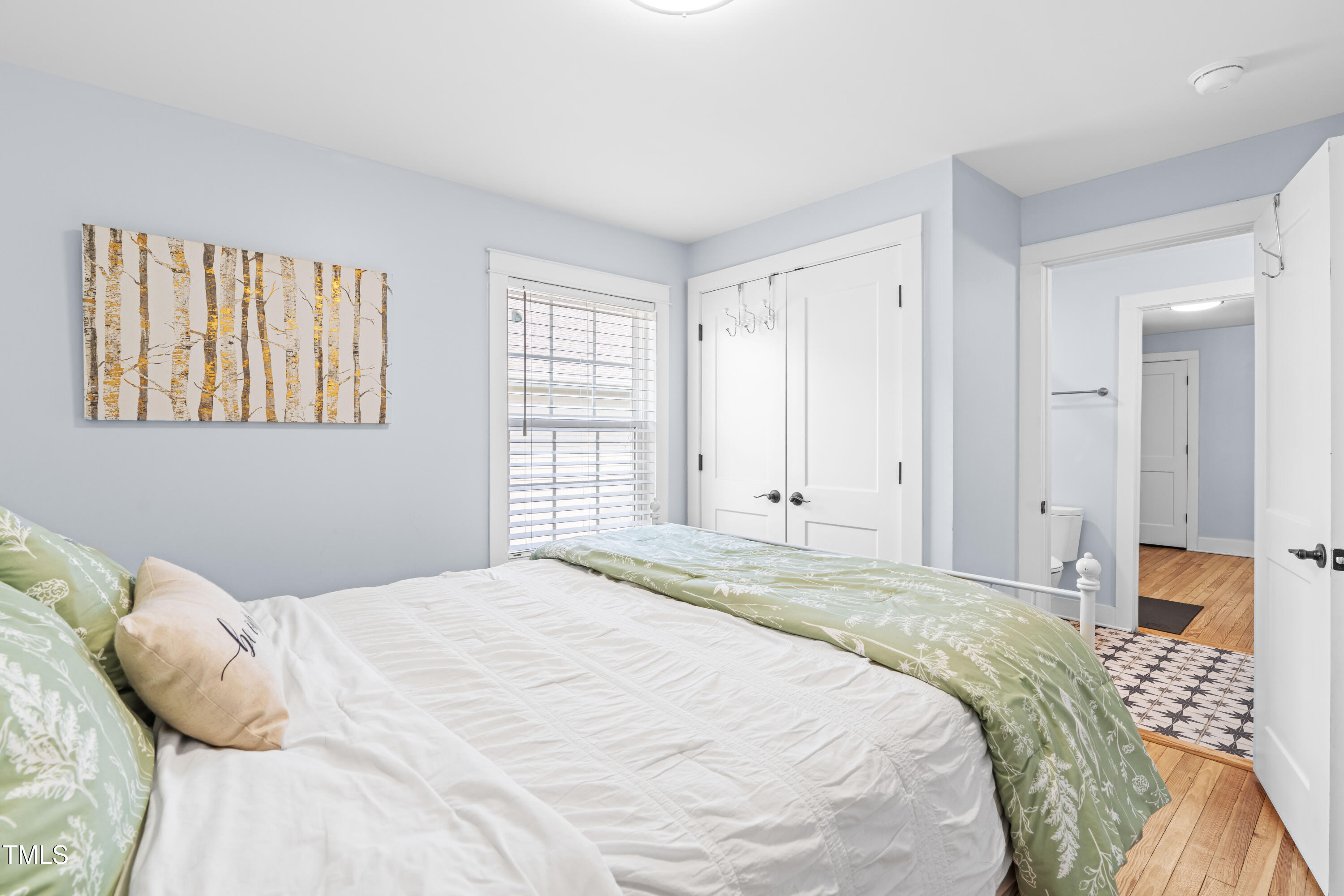 1023 Kent Street Durham, NC 27707 - Photo 22 of 40 a bedroom with a bed and a window