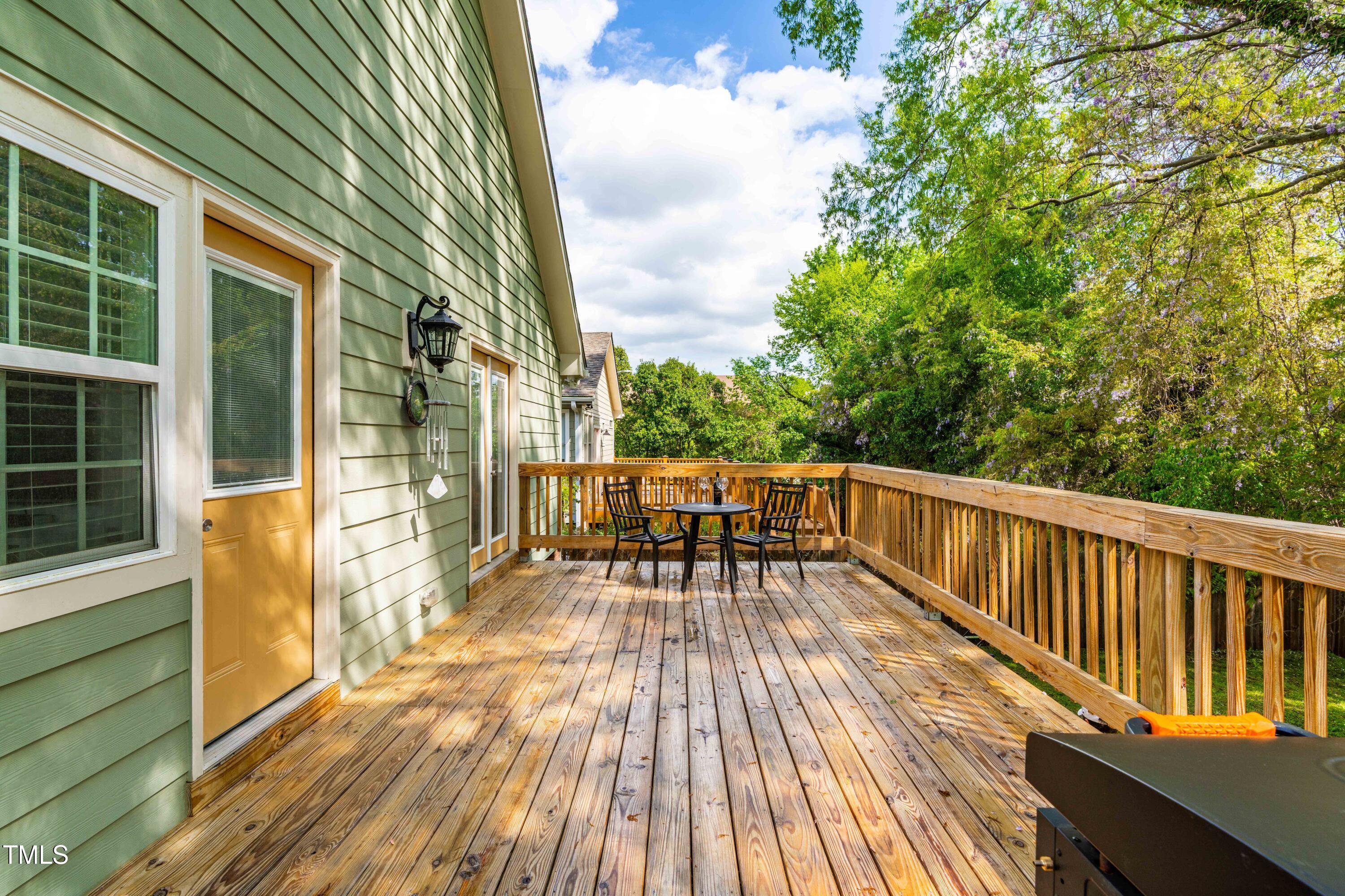 1023 Kent Street Durham, NC 27707 - Photo 35 of 40 a balcony with wooden floor table and chairs