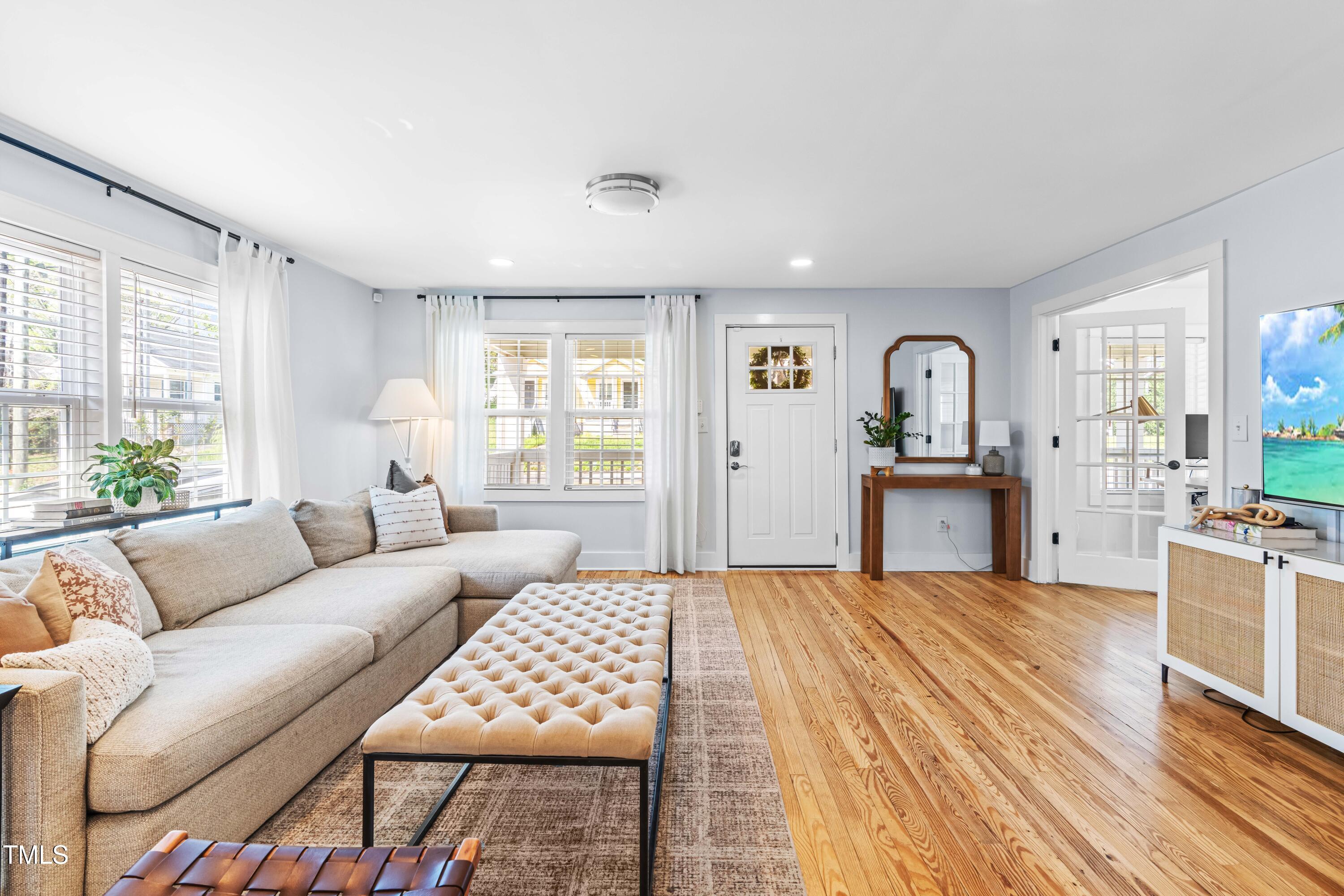 1023 Kent Street Durham, NC 27707 - Photo 6 of 40 a living room with furniture and a large window