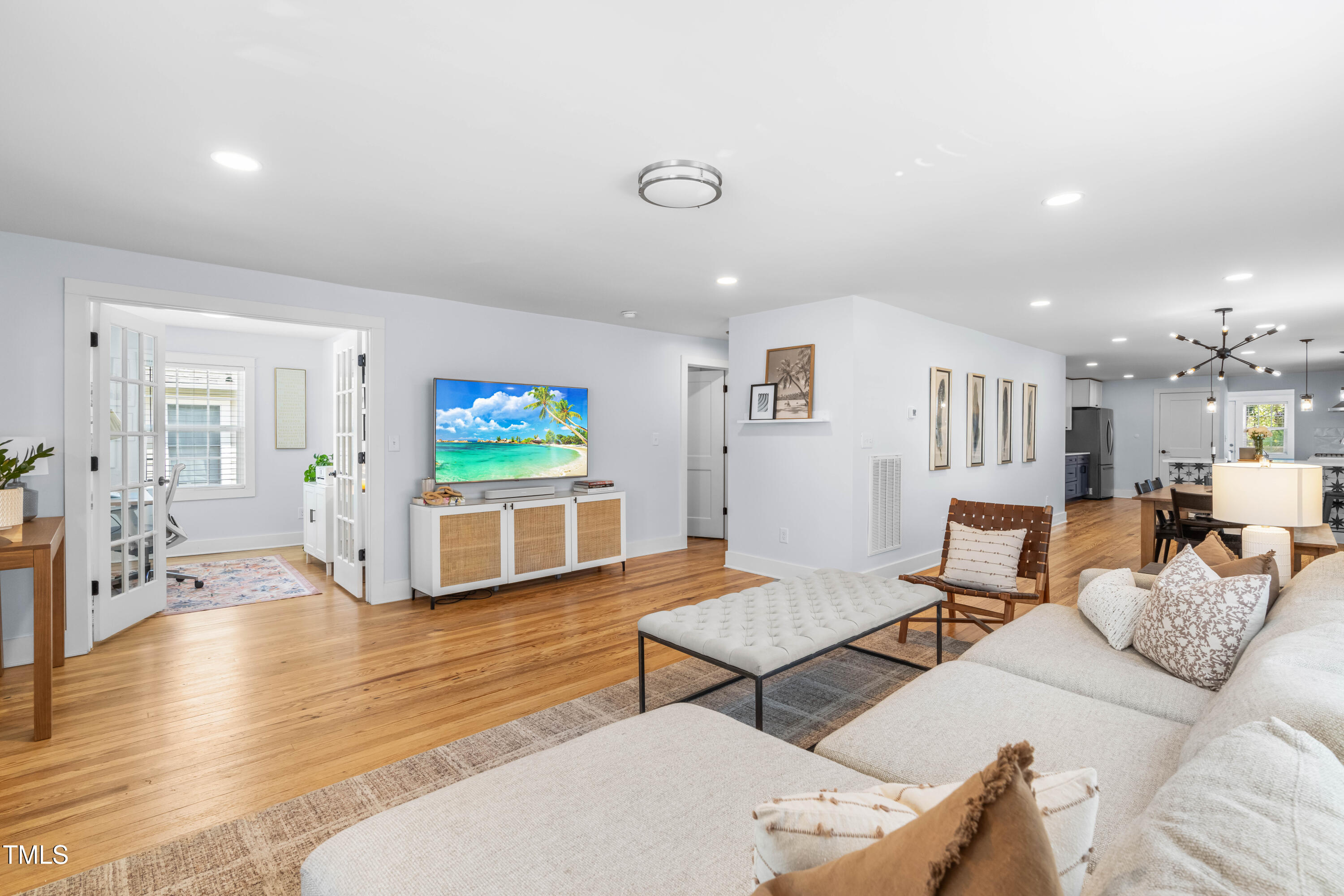 1023 Kent Street Durham, NC 27707 - Photo 9 of 40 a living room with furniture and a wooden floor