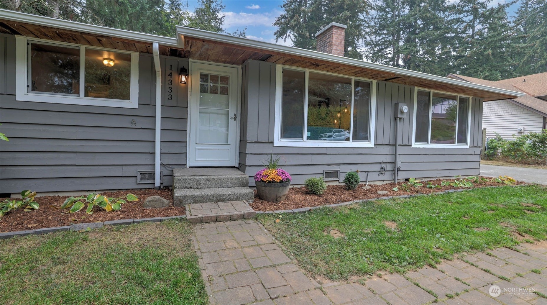 14333 165th Place Southeast Renton, WA 98059 - Photo 1 of 36 a front view of house with yard