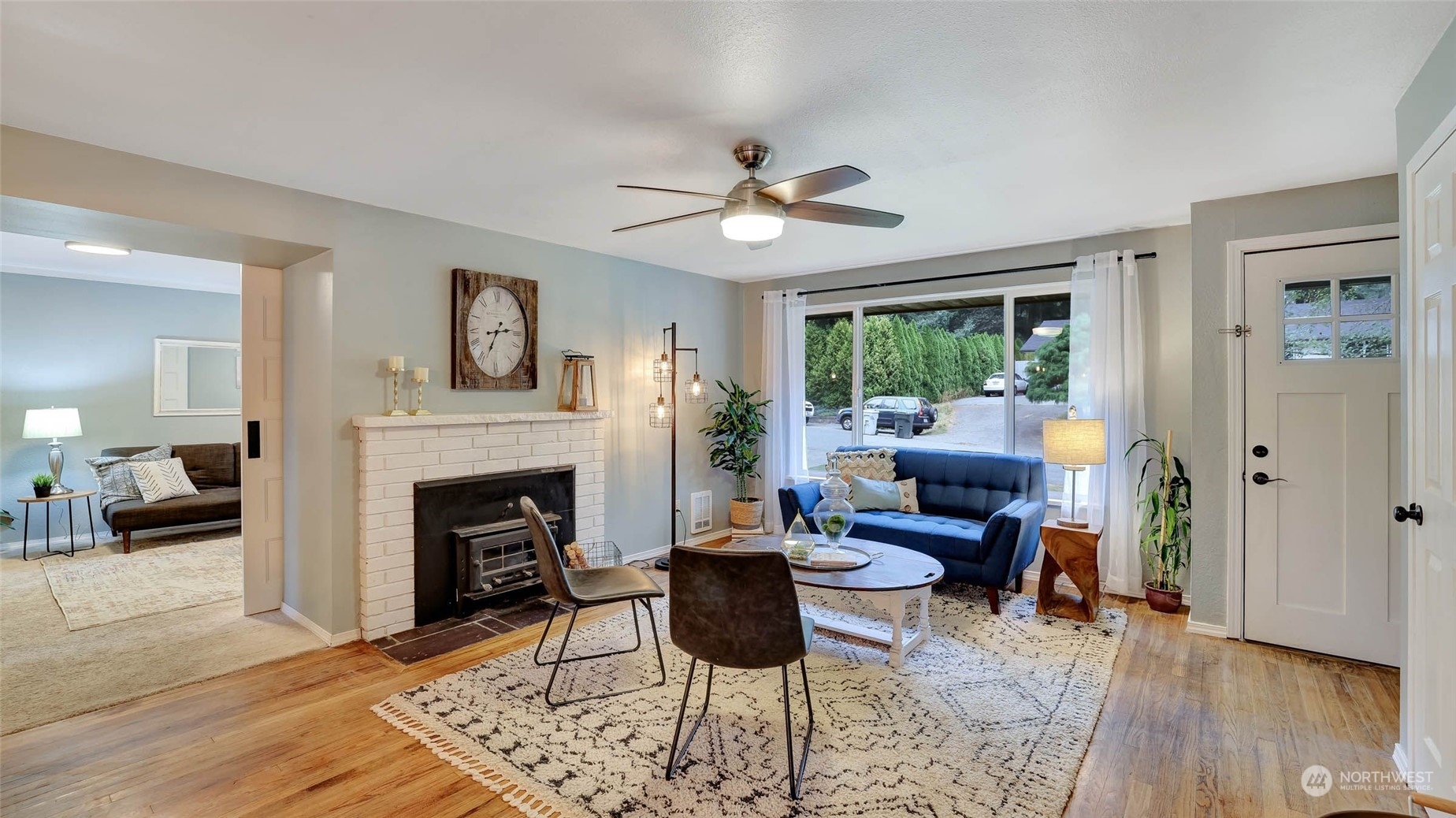 14333 165th Place Southeast Renton, WA 98059 - Photo 15 of 36 a living room with furniture and a fireplace