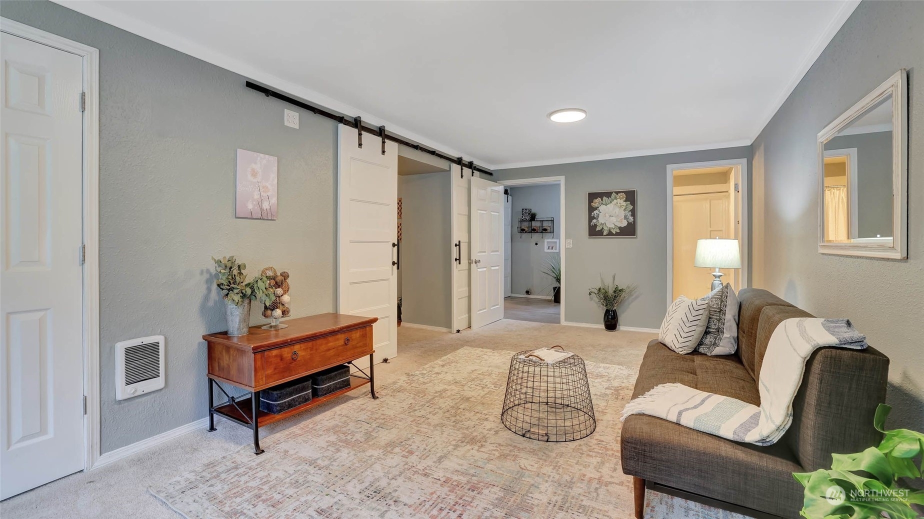 14333 165th Place Southeast Renton, WA 98059 - Photo 17 of 36 a living room with furniture a lamp and a window