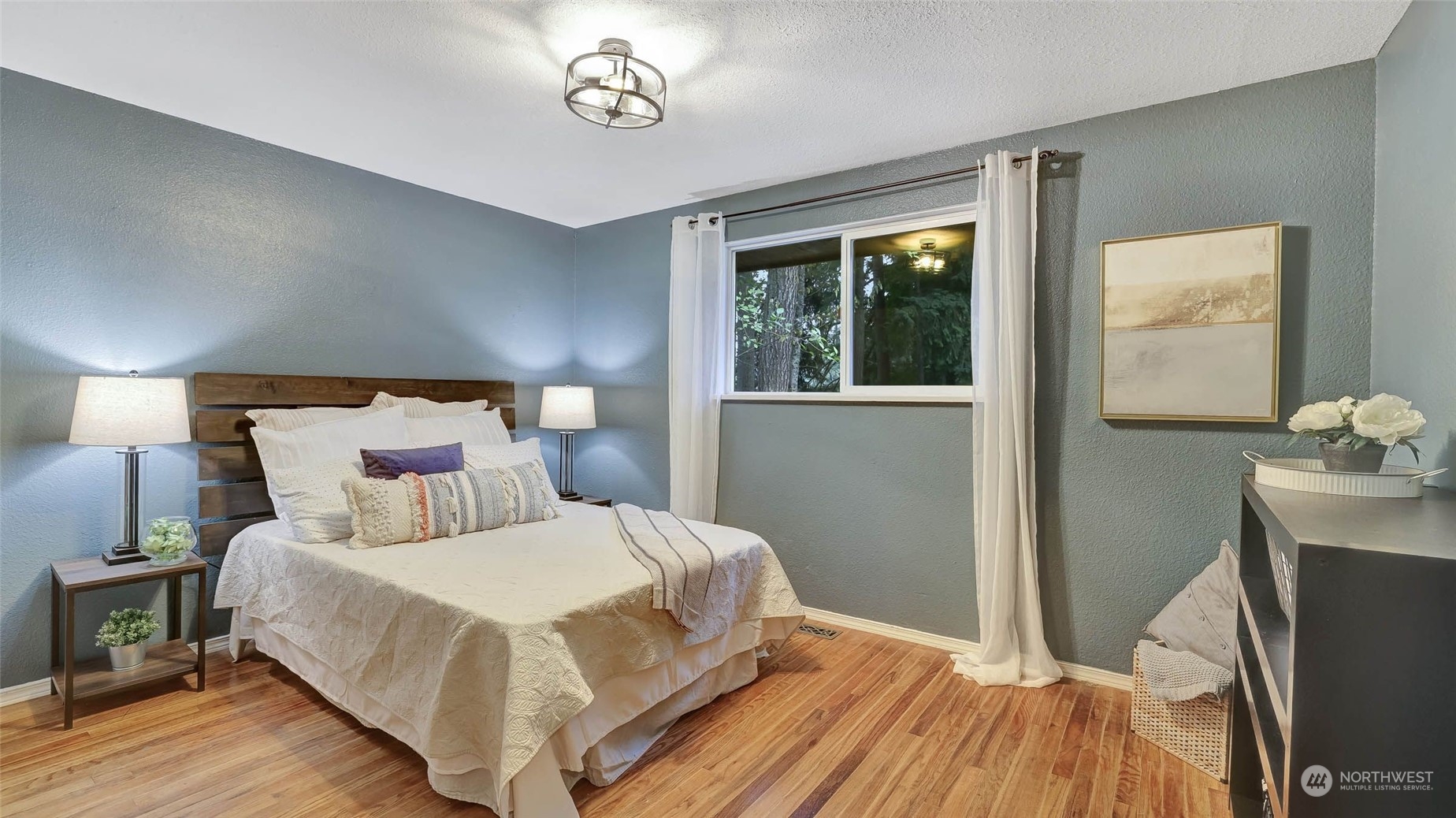 14333 165th Place Southeast Renton, WA 98059 - Photo 19 of 36 a bedroom with a bed and a window