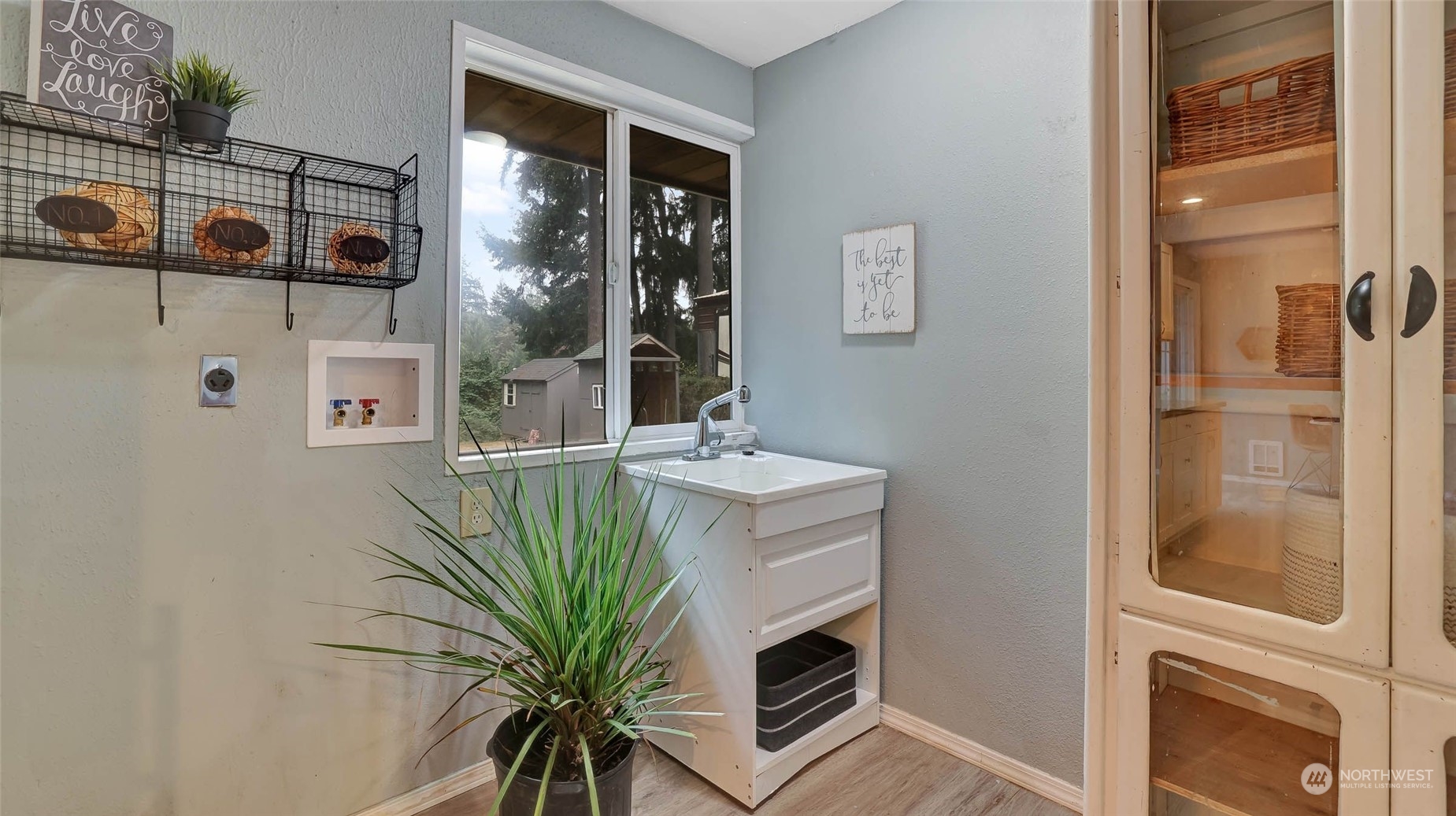 14333 165th Place Southeast Renton, WA 98059 - Photo 25 of 36 a bathroom with a sink a mirror and shower