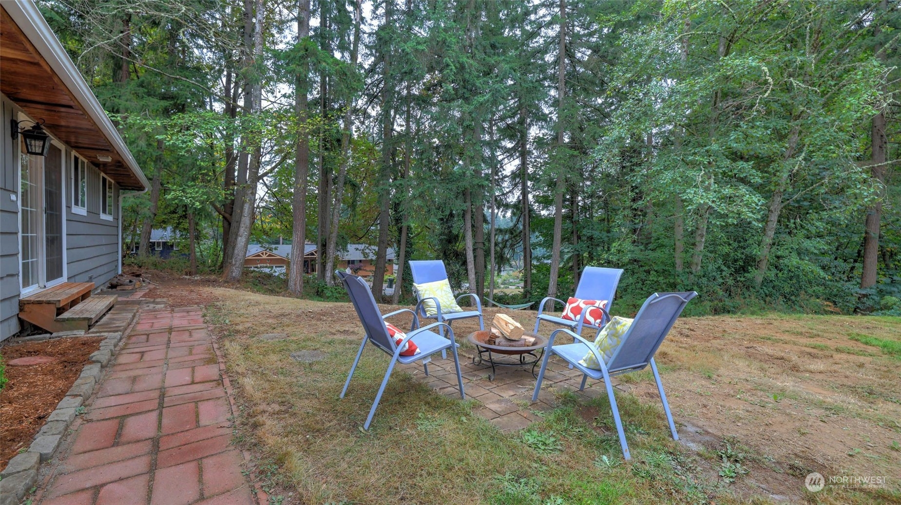 14333 165th Place Southeast Renton, WA 98059 - Photo 26 of 36 a backyard of a house with table and chairs