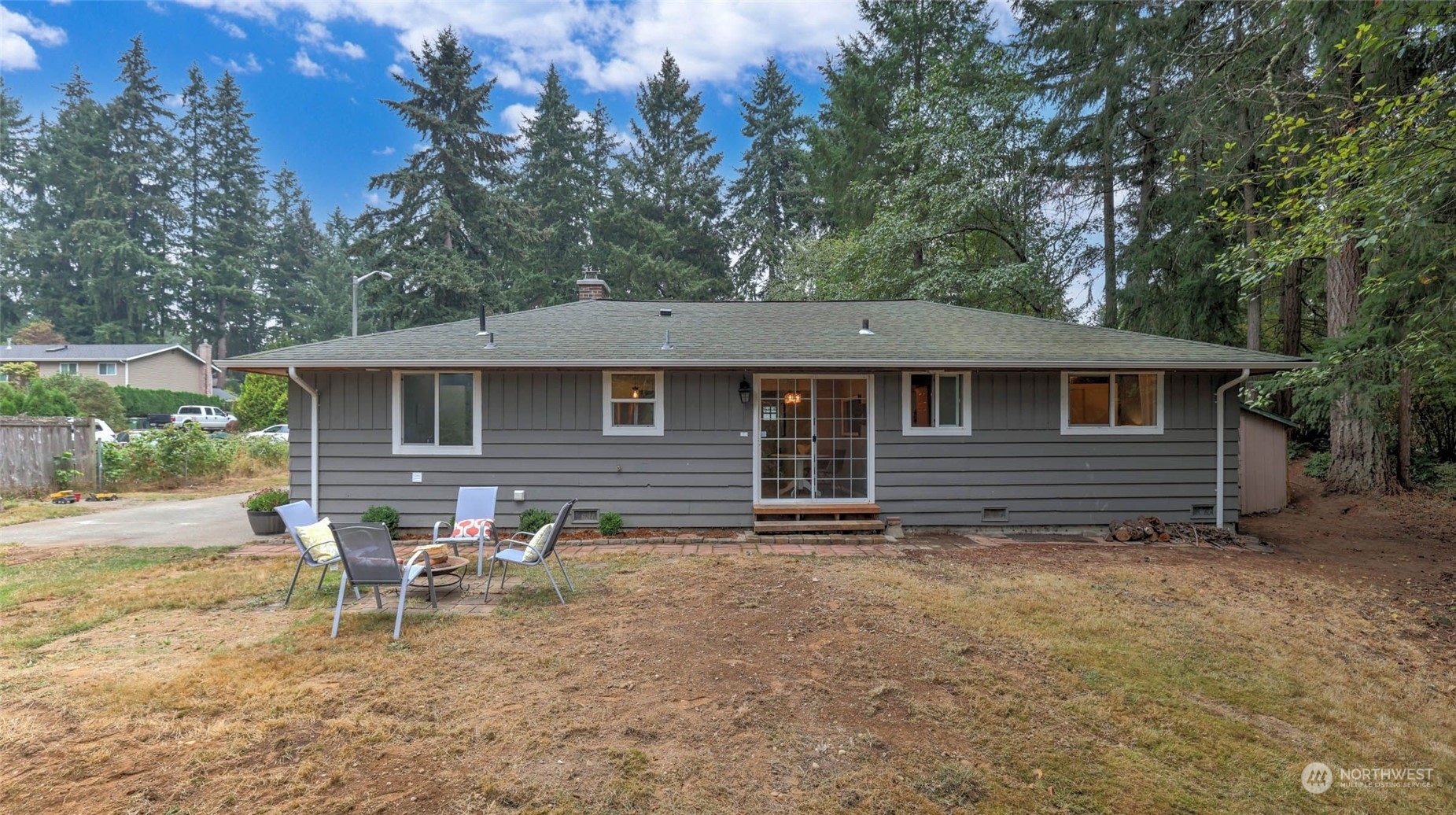 14333 165th Place Southeast Renton, WA 98059 - Photo 32 of 36 a backyard of a house with table and chairs