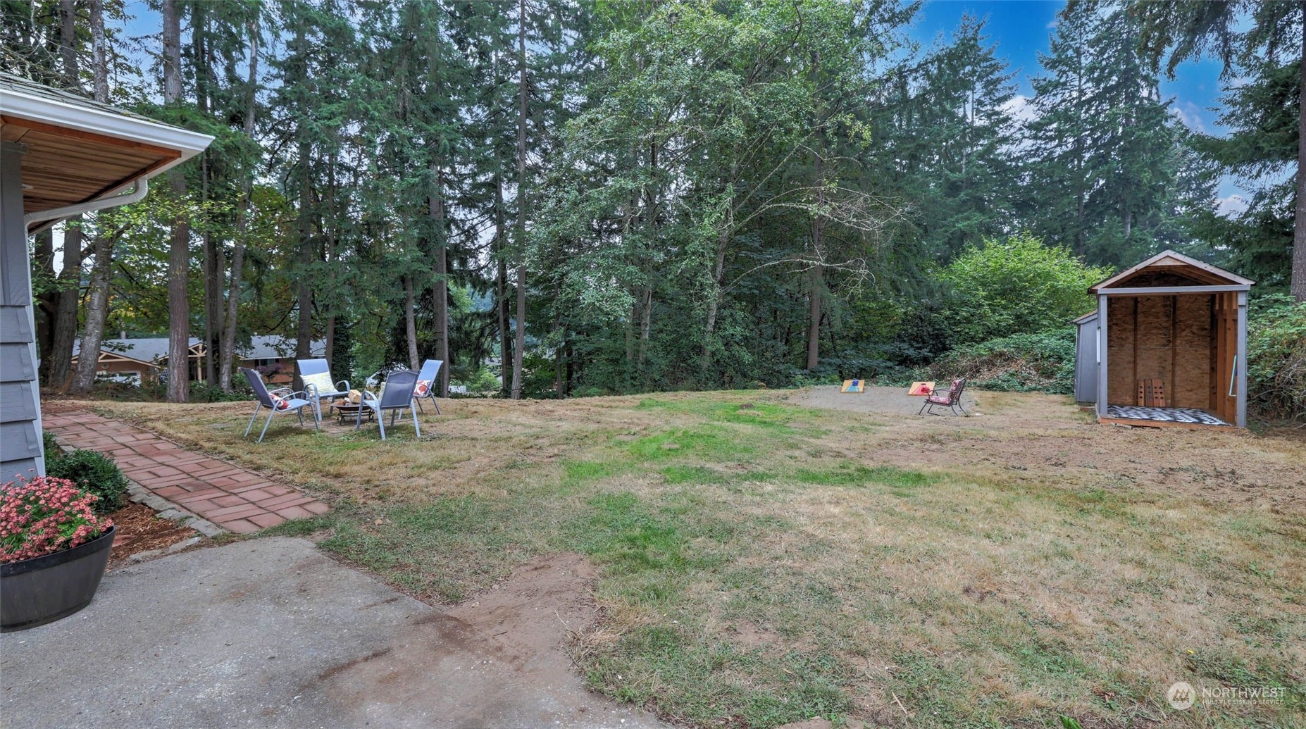 14333 165th Place Southeast Renton, WA 98059 - Photo 33 of 36 a backyard of a house with table and chairs