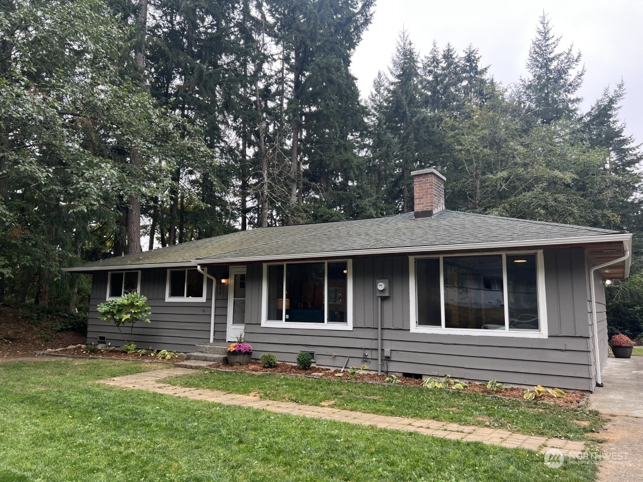 14333 165th Place Southeast Renton, WA 98059 - Photo 35 of 36 a front view of a house with a yard