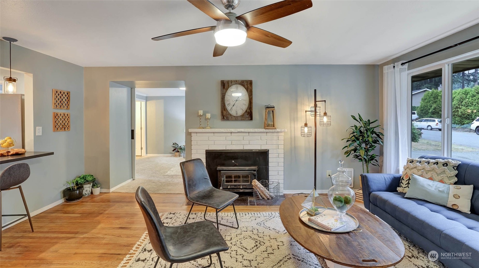 14333 165th Place Southeast Renton, WA 98059 - Photo 5 of 36 a living room with furniture and a fireplace