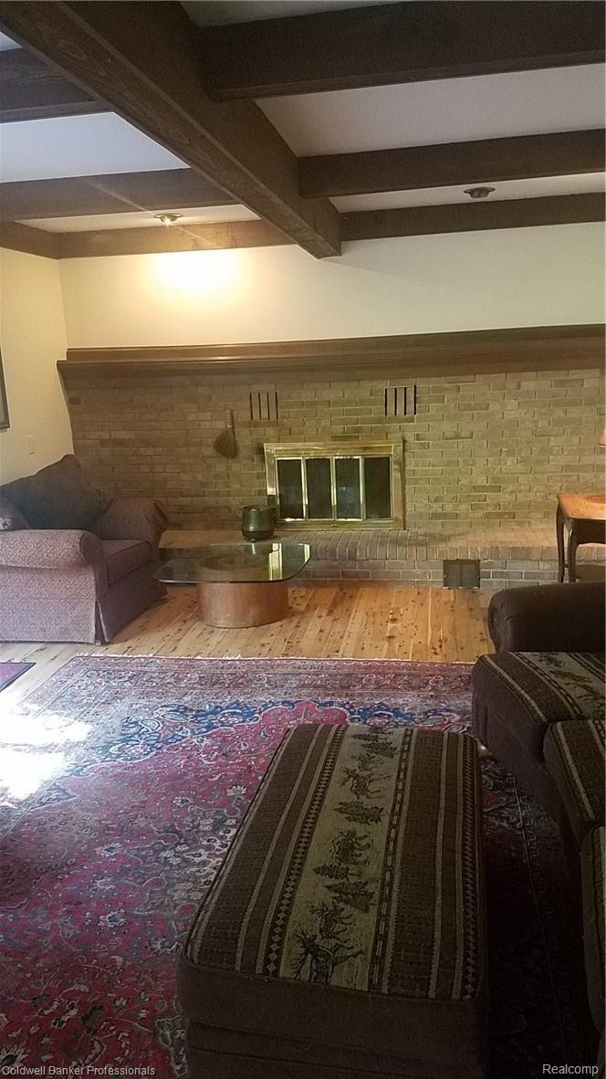 10095 Gibbs Road Clarkston, MI 48348 - Photo 11 of 44 Natural wood fireplace