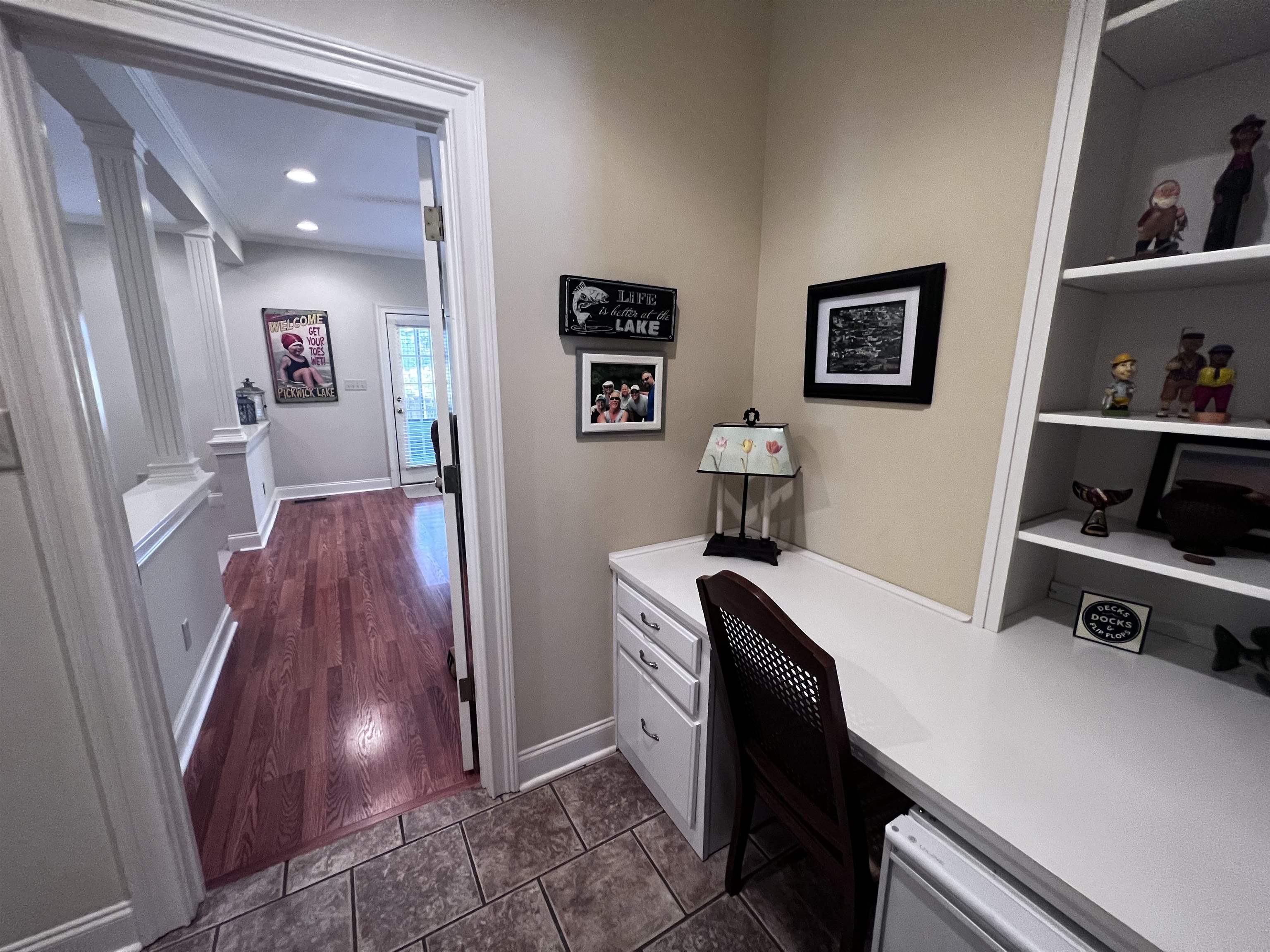 16 Jennifer Junction Iuka, MS 38852 - Photo 11 of 36 a view of a hallway with workspace and a window