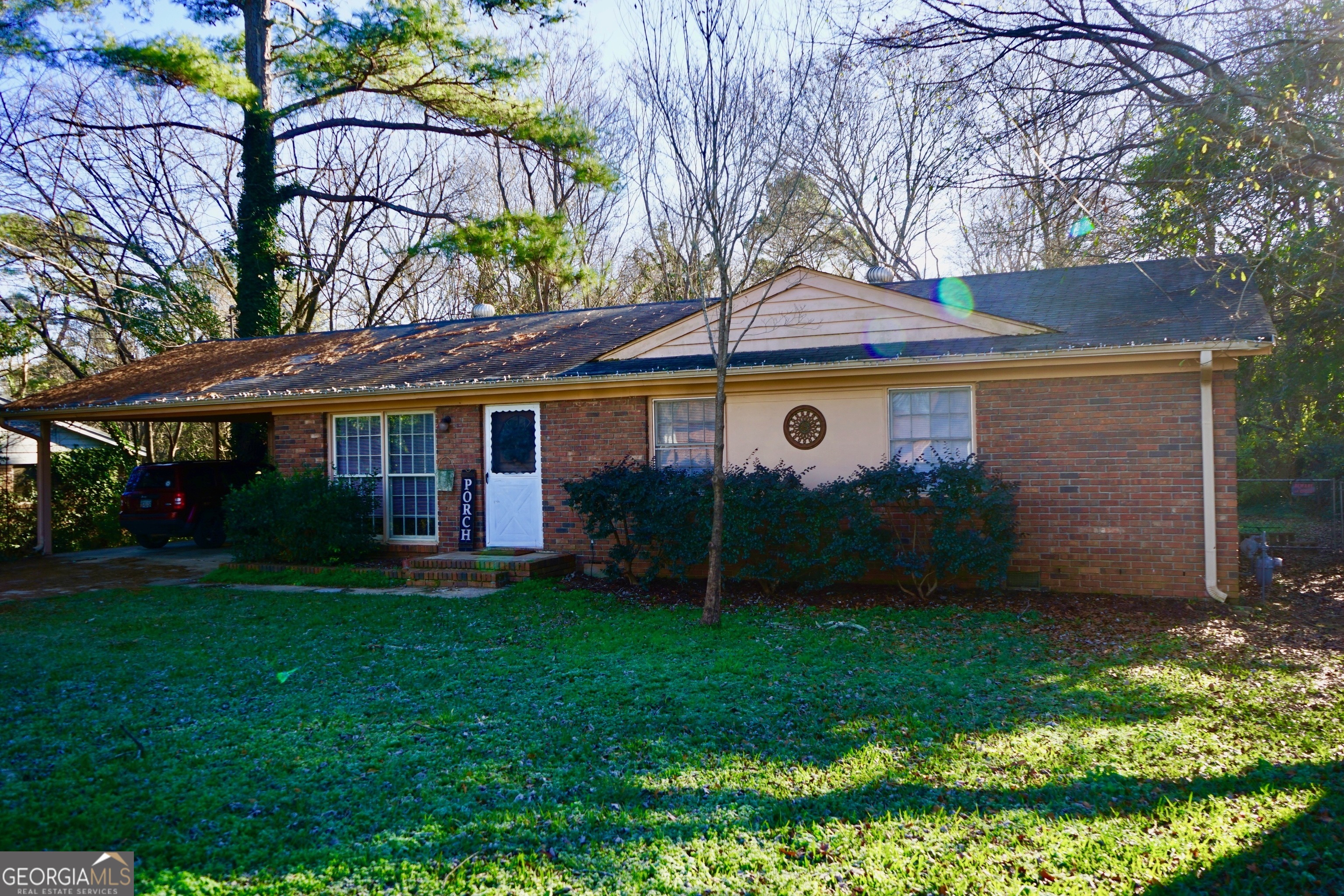 front view of a house with a yard