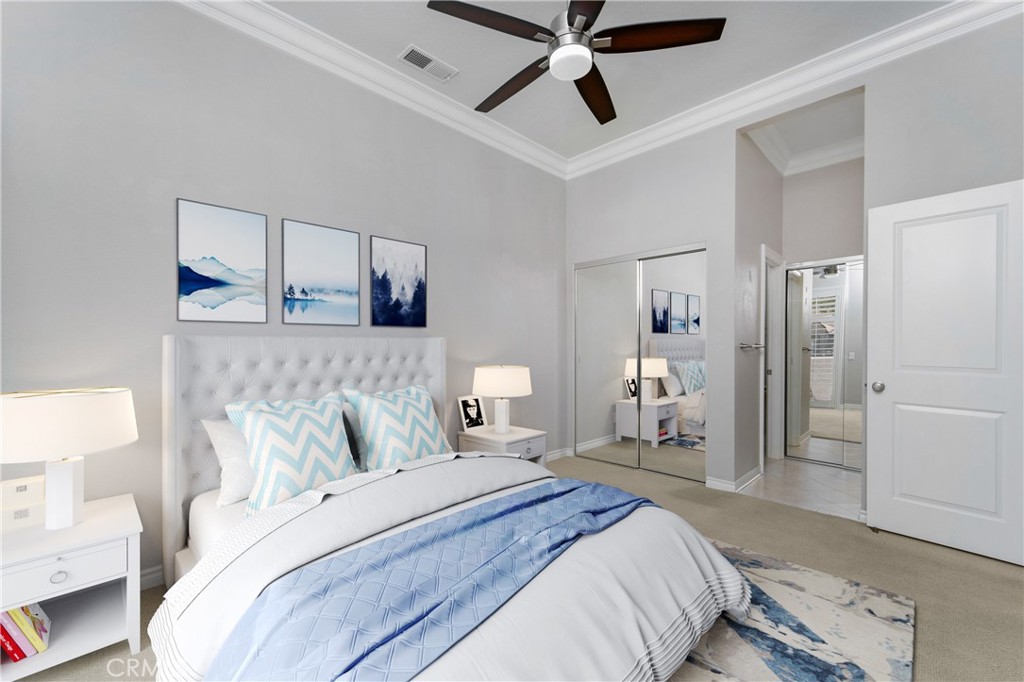 9 Sunbridge Place Dana Point, CA 92629 - Photo 16 of 21 a bedroom with a bed and a chandelier