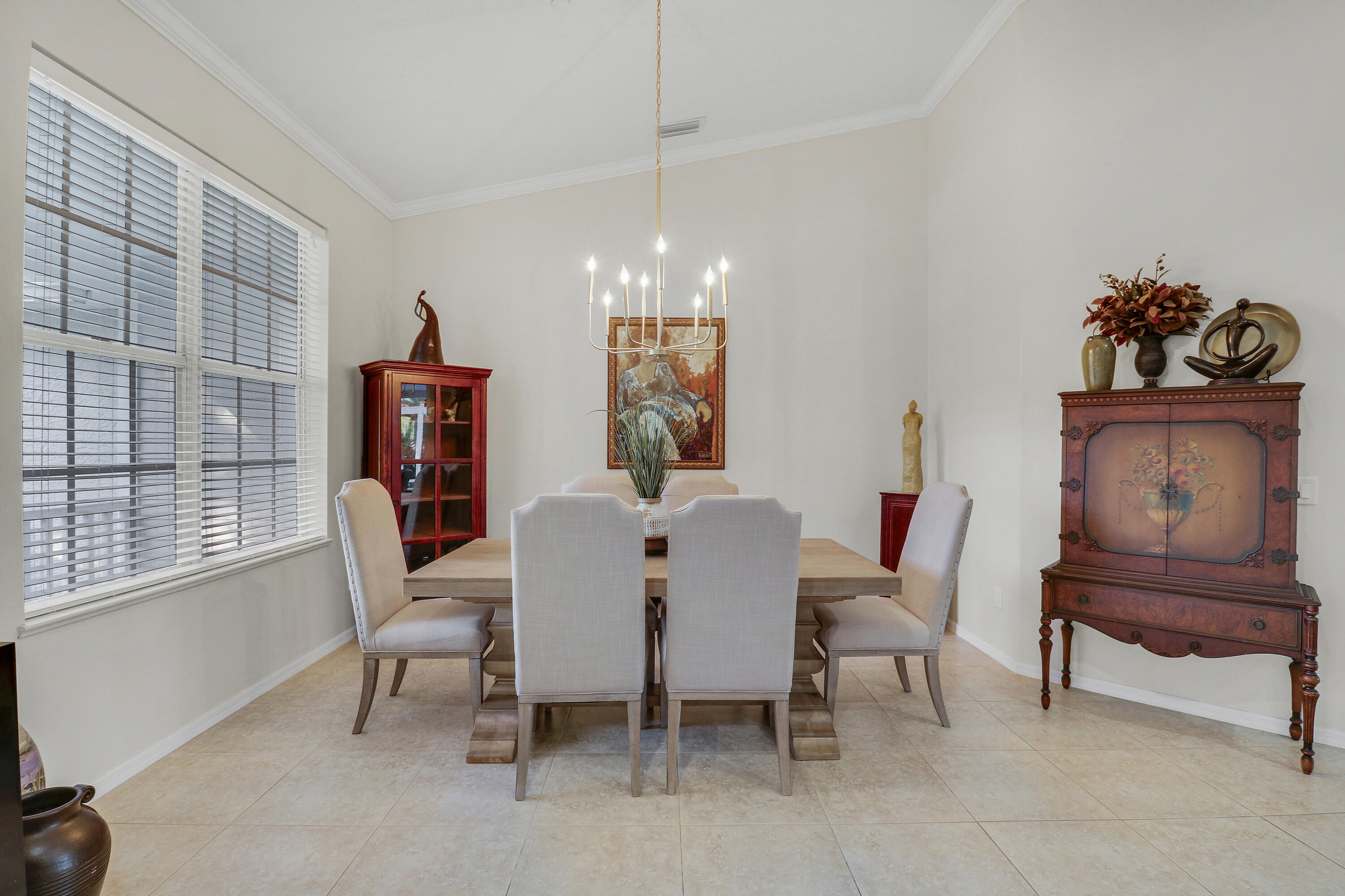 149 Southeast Ashley Oaks Way Stuart, FL 34997 - Photo 15 of 47 a view of a dining room with furniture and window