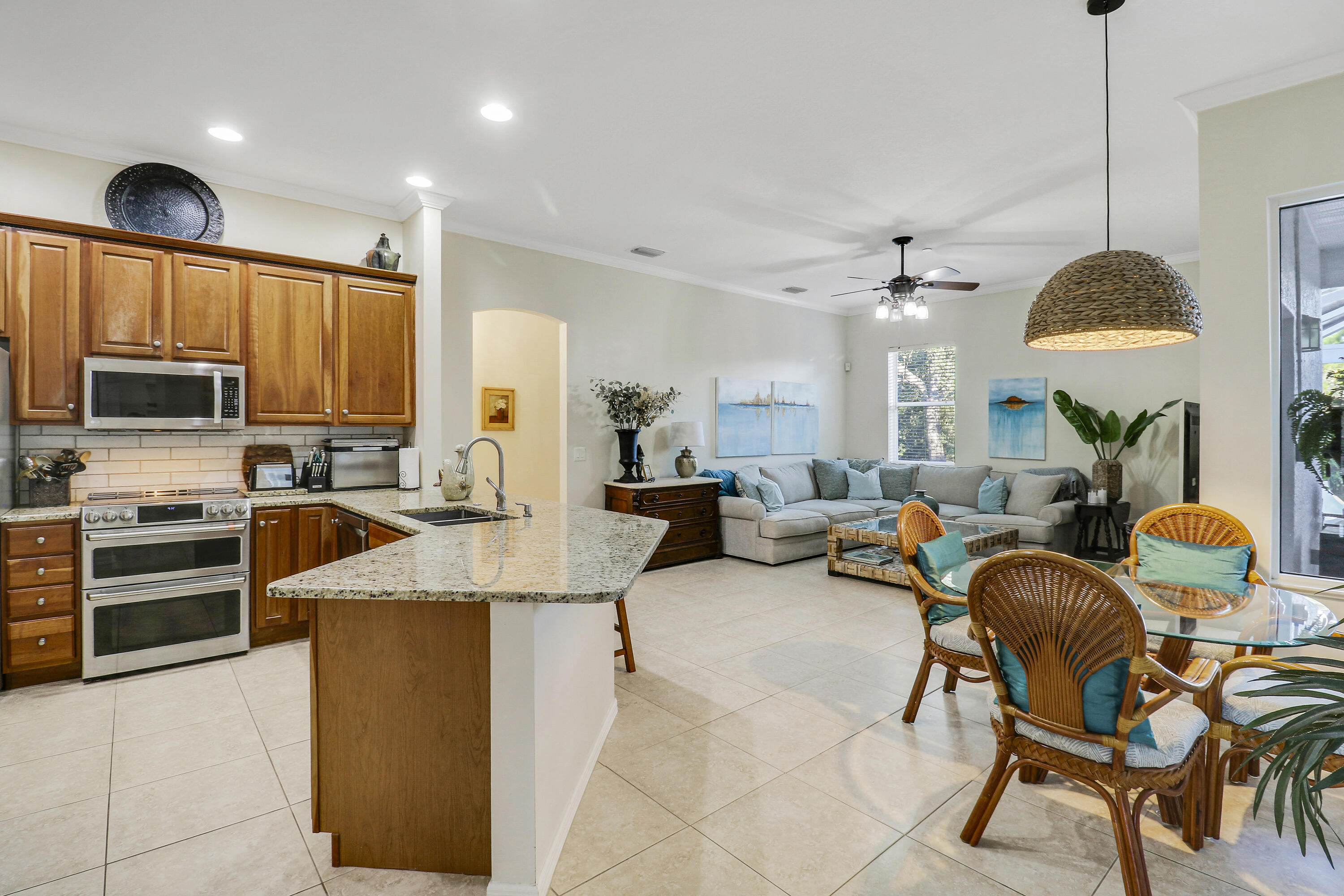 149 Southeast Ashley Oaks Way Stuart, FL 34997 - Photo 23 of 47 Open Concept with Snackbar