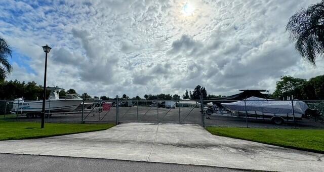 149 Southeast Ashley Oaks Way Stuart, FL 34997 - Photo 35 of 47 a view of outdoor space with yard and lake view