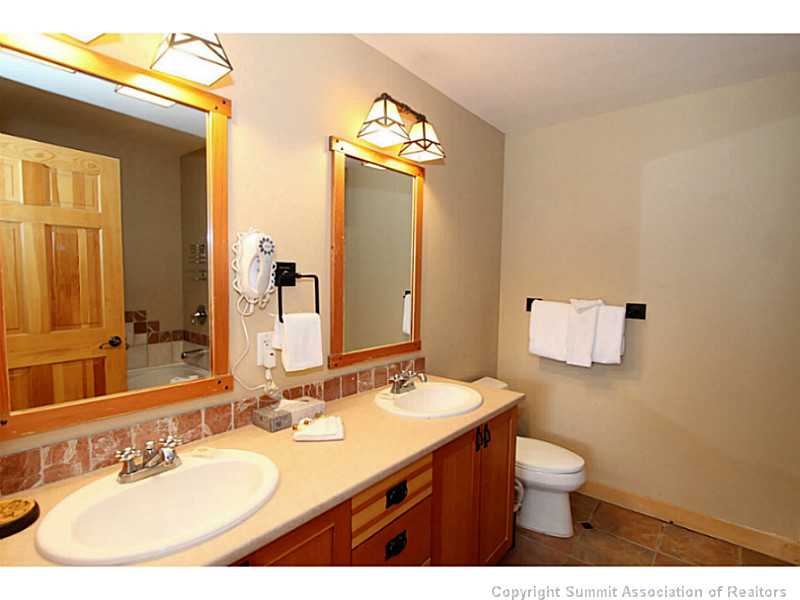 910 Copper Road, Unit 214 Frisco, CO 80443 - Photo 11 of 15 Bathroom. This is the master bathroom with double vanity sinks. The tub and shower not seen in the photo.