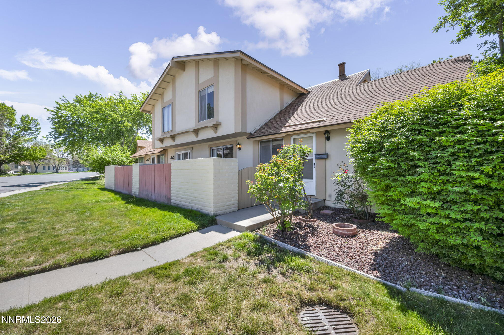 19 Condor Circle Carson City, NV 89701 - Photo 1 of 41 a front view of a house with garden