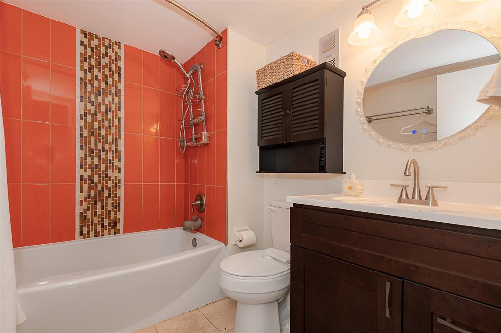 5300 Northeast 24th Terrace, Unit 512 Fort Lauderdale, FL 33308 - Photo 14 of 29 a bathroom with a sink a toilet and shower