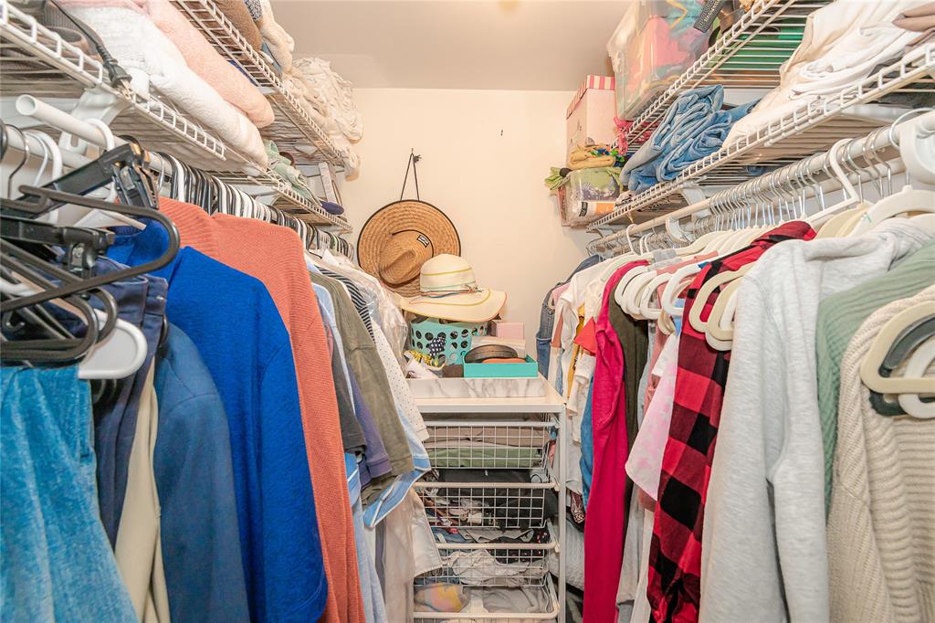 5300 Northeast 24th Terrace, Unit 512 Fort Lauderdale, FL 33308 - Photo 15 of 29 a view of walk in closet with clothes and shoes