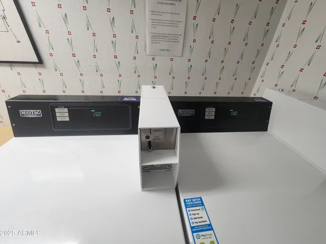 a view of a brick house with a yard