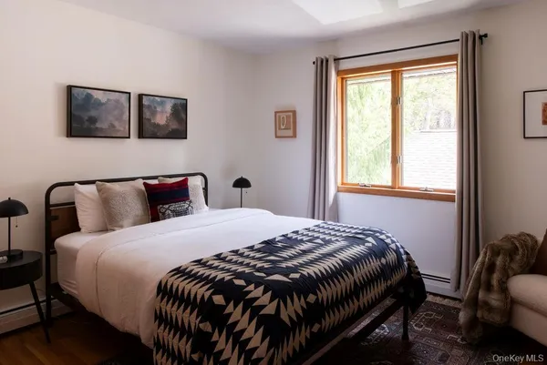 a bedroom with a bed and a closet