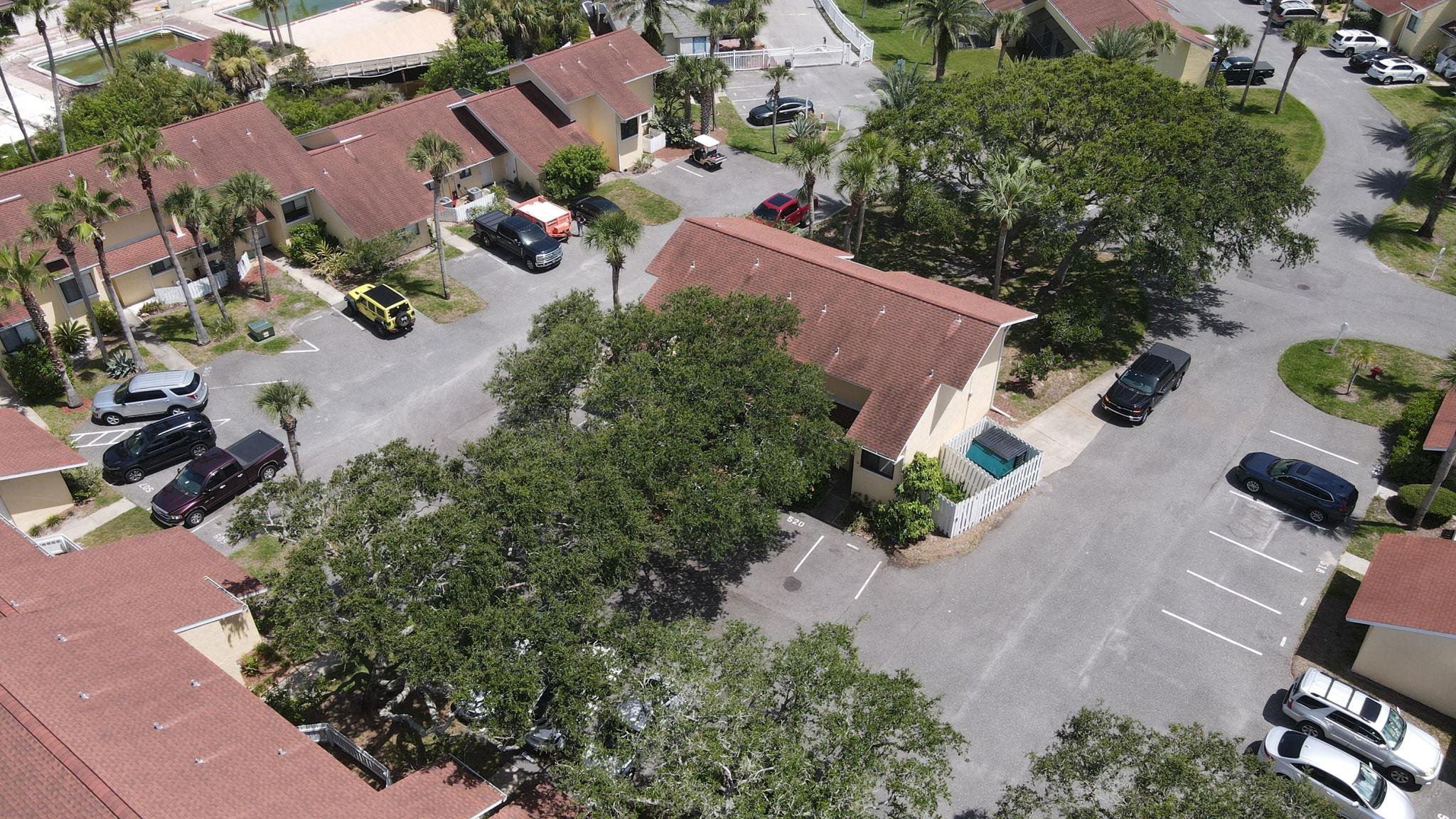 3960 A1A South, Unit 520 St. Augustine, FL 32080 - Photo 41 of 51 an aerial view of multiple houses with yard